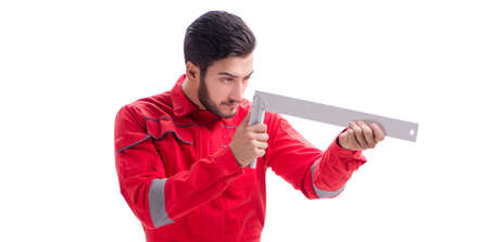 Young repairman with a square ruler isolated on white background