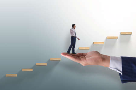 The career ladder concept with businessmanの写真素材