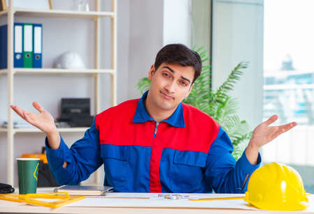 Foreman looking at construction plan