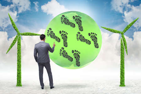Carbon footprint concept with businessman