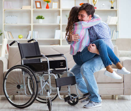 The young family taking care of each otherの写真素材