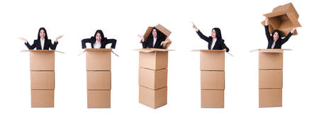 The woman with lots of boxes on whiteの写真素材