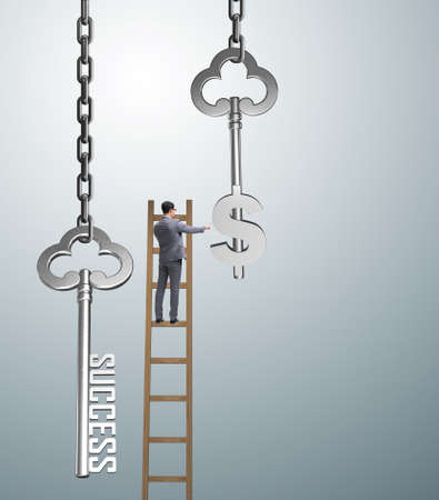Businessman in key to financial success conceptの写真素材