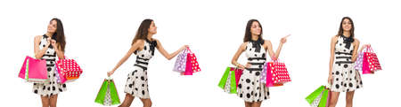 The woman with shopping bags isolated on whiteの写真素材