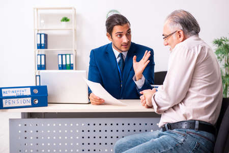 Financial advisor giving retirement advice to old manの写真素材