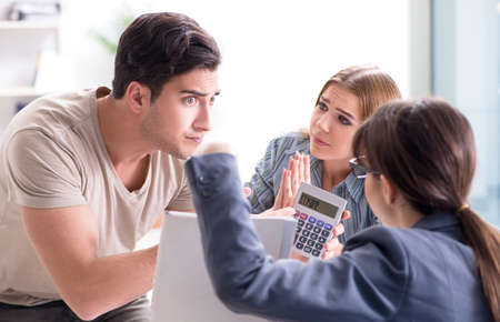 Young family dissappointed at high interest mortgage rate in bank