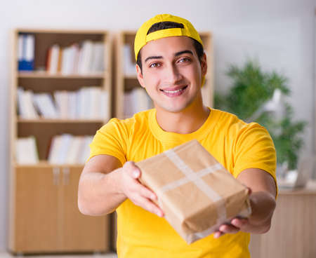 Delivery man delivering parcel box