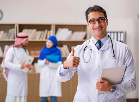 Diversity concept with doctors in hospitalの写真素材