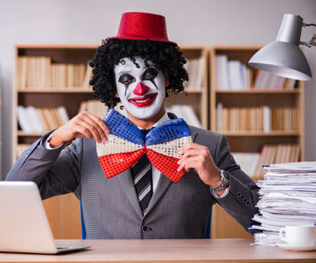 Clown businessman working in the office
