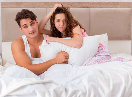 Family conflict with wife husband in bed