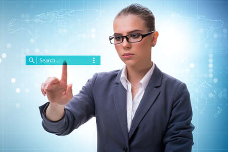 Search concept with businessman pressing buttonの写真素材