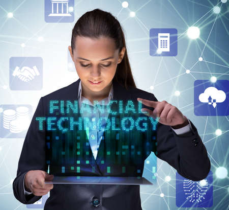 Businesswoman with tablet in financial technology fintech concep