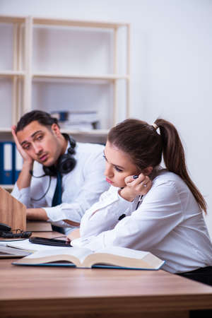 Call center operators working in the officeの写真素材