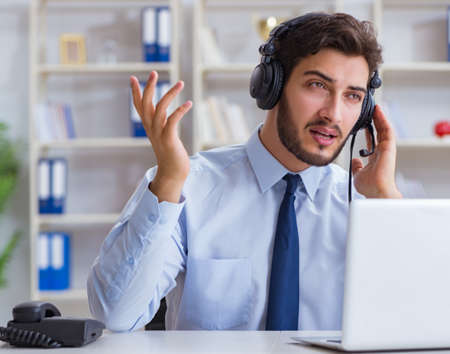 Call center employee working in office