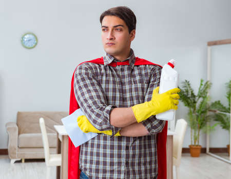 Super hero cleaner working at homeの写真素材