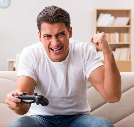 Man addicted to computer gamesの写真素材