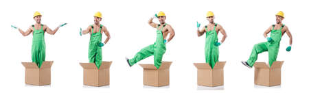 Man in coveralls with boxesの写真素材