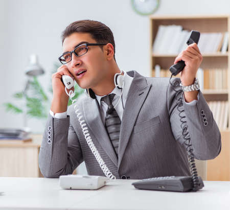 Angry helpdesk operator in the officeの写真素材
