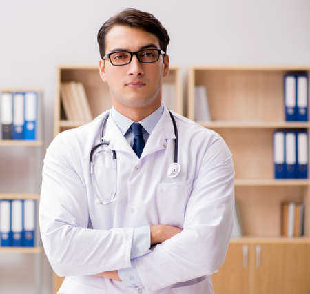 Young adult doctor working in the hospitalの写真素材