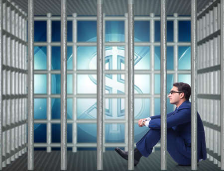 Man trapped in prison with dollarsの写真素材