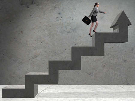 Young businesswoman climbing career ladder