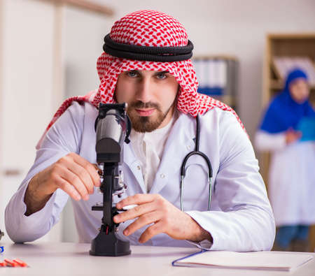 Arab doctor working in the lab hospital