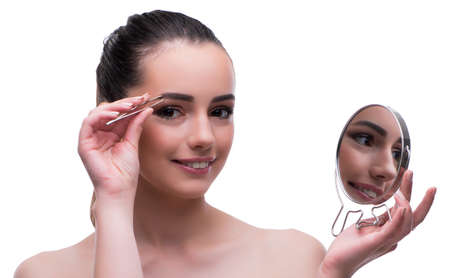 Woman in beauty concept applying make up using cosmetics