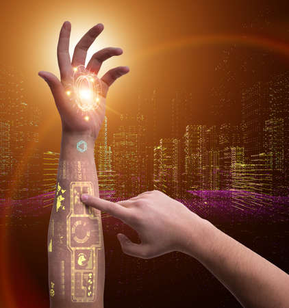 Human robotic hand in futuristic concept