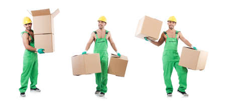Man in green coveralls with boxesの写真素材