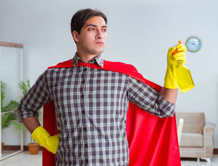 Super hero cleaner working at homeの写真素材