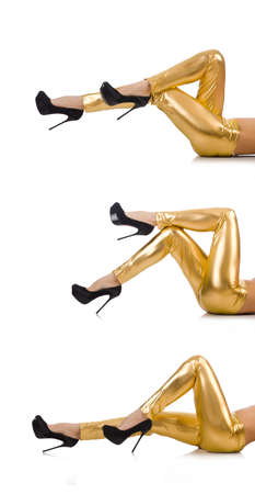 Woman legs with stockings on whiteの写真素材