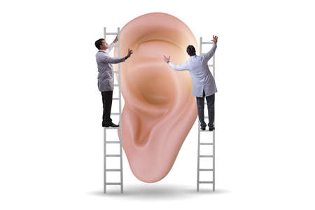The doctor examining giant ear in medical conceptの写真素材
