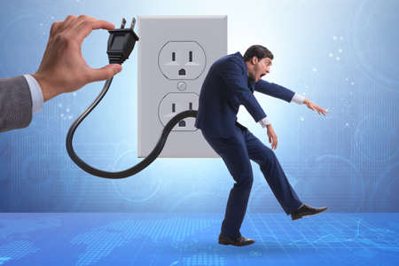 Businessman losing energy to work