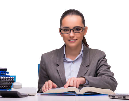 Young businesswoman in office isolated on whiteの写真素材