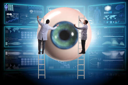 Doctor examining giant eye in medical concept