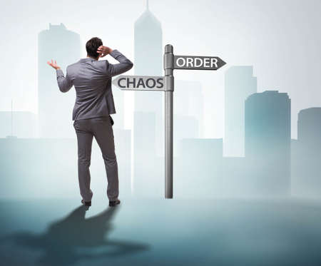 Businessman in difficult choice conceptの写真素材