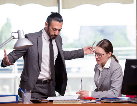 Woman and man in the business conceptの写真素材