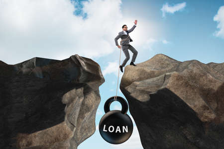 The concept of debt and load with businessmanの写真素材