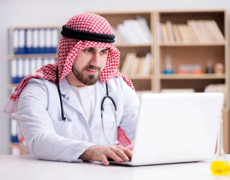 Arab doctor working in the lab hospitalの写真素材