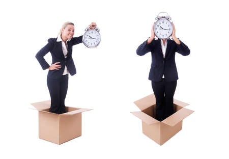 Woman with clock in the boxの写真素材