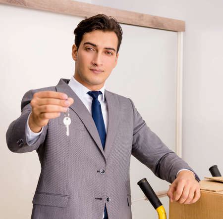 Real estate agent with key from new houseの写真素材