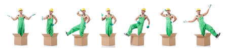 The man in coveralls with boxes