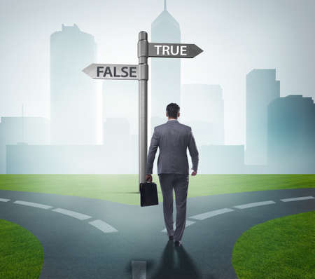 The businessman in difficult choice conceptの写真素材