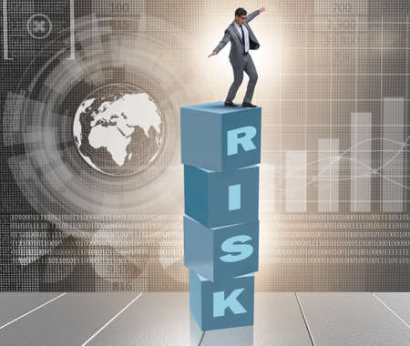 Businessman in risk and reward business conceptの写真素材