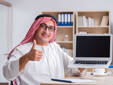 Young arab businessman in business conceptの写真素材