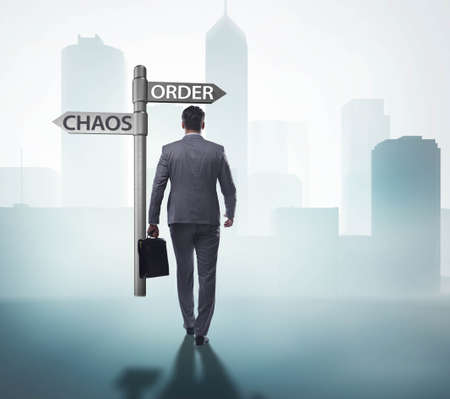 The businessman in difficult choice conceptの写真素材