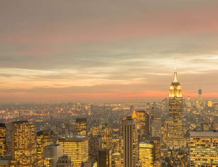 The view of new york manhattan during sunset hours