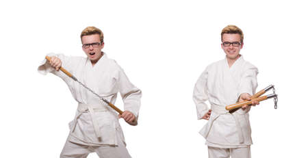 Funny karate fighter with nunchucks on whiteの写真素材
