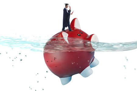 Student debt concept with piggybank and studentの写真素材