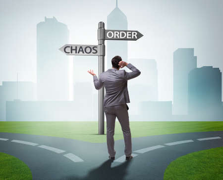 The businessman in difficult choice conceptの写真素材